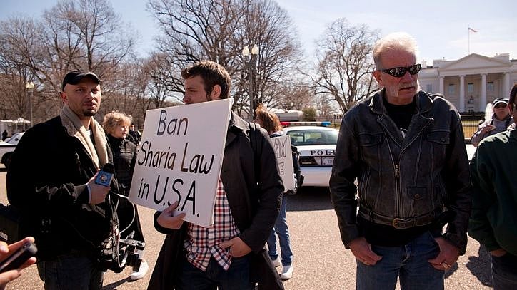 March 3, 2011: Protest against Shariat law in front of the White House. Some man stay together, one men keep the poster with anti-shariah slogan. Image used for representational purpose only.&nbsp;