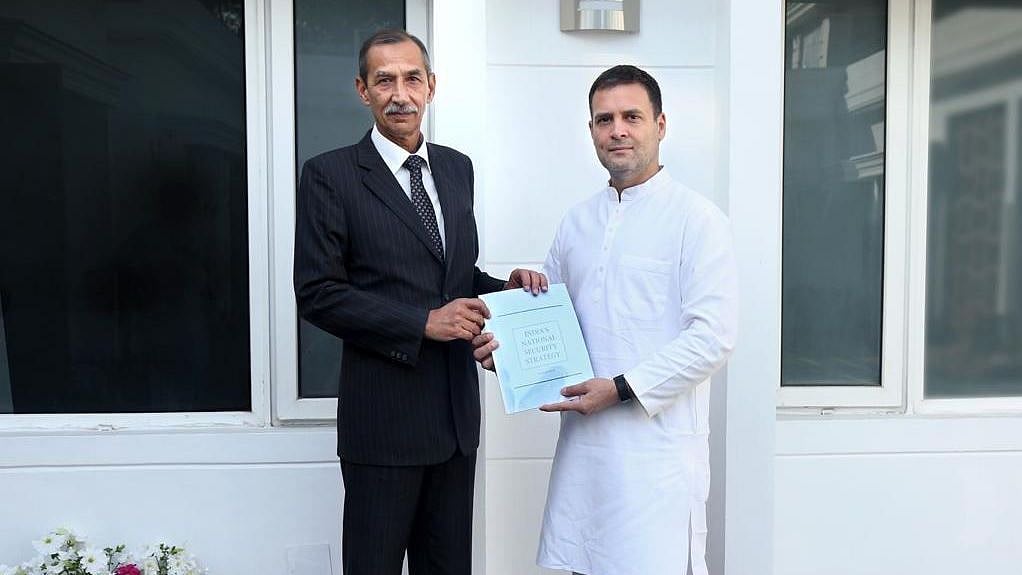 Lt Gen Hooda submitting his report to Congress President Rahul Gandhi