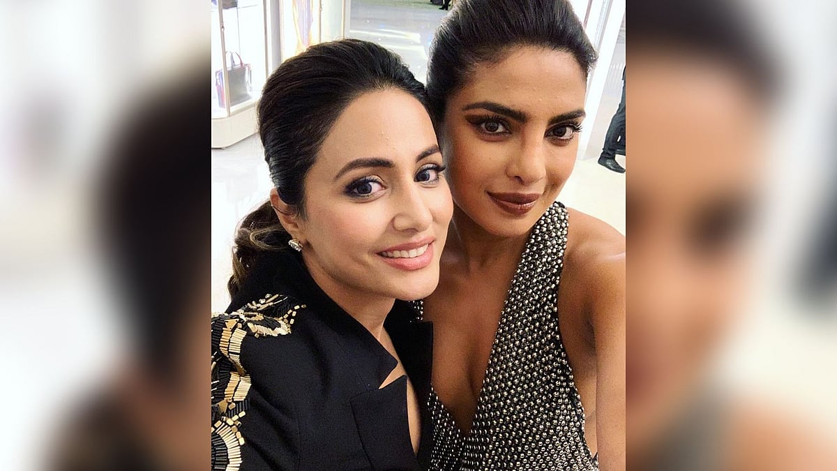Hina Khan poses with Priyanka Chopra at Cannes 2019.