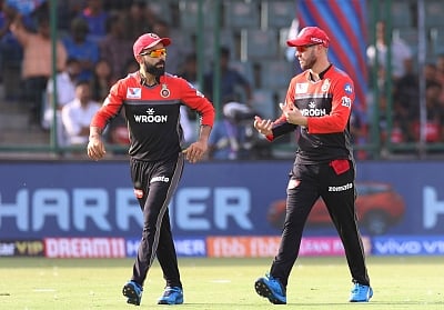 Virat Kohli and AB de Villiers. (Photo: Surjeet Yadav/IANS)