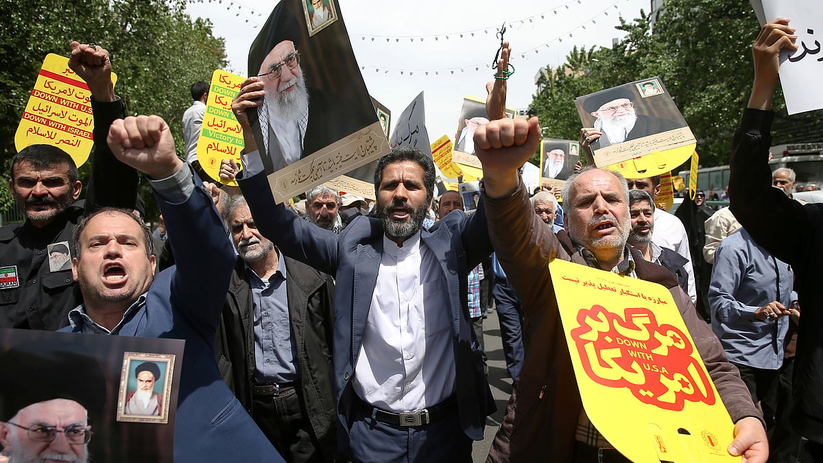 Worshippers chant slogans against the United States and Israel during a rally after Friday prayers in Tehran, Iran, Friday, 10 May 2019. 