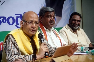 Congress leader Abhishek Manu Singhvi (R). (Photo: IANS)