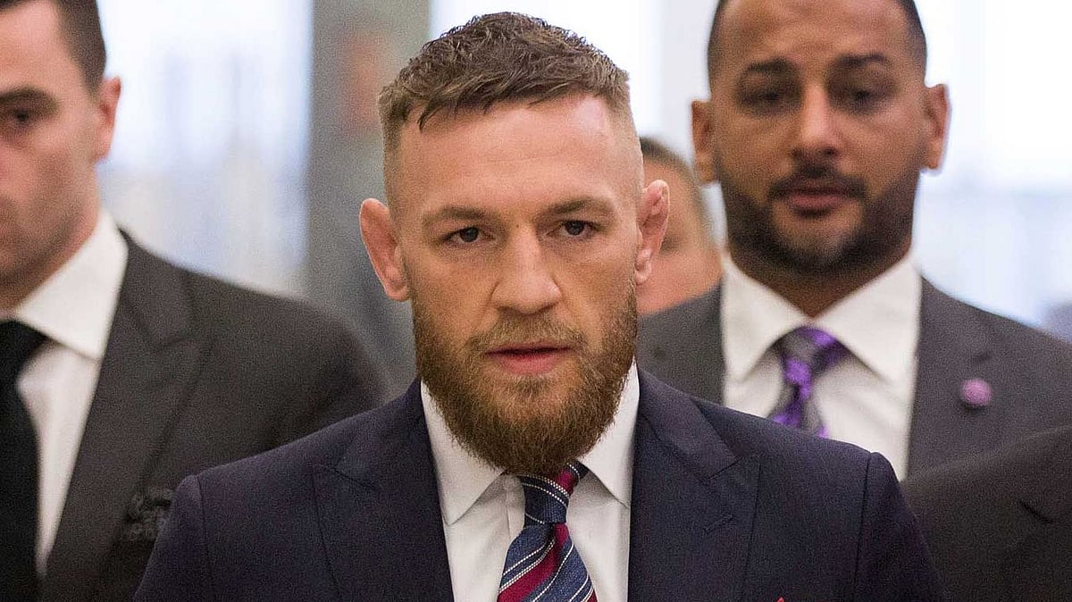 Prosecutors have dropped charges against star fighter Conor McGregor after he allegedly smashed a fan’s phone.