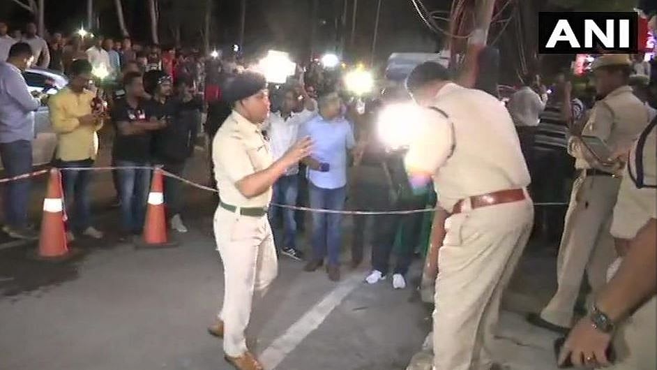 Police inspect the blast site in Guwahati, Assam.