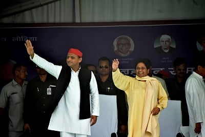 Varanasi: Samajwadi Party (SP) chief Akhilesh Yadav and BSP supremo Mayawati at a joint rally of SP, BSP and RLD in Varanasi, Uttar Pradesh on May 16, 2019. (Photo: IANS)