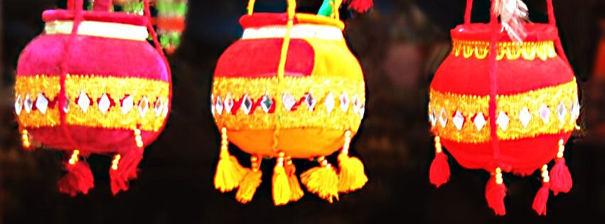 Photo Courtesy: <a href="https://www.istockphoto.com/in/photo/colorful-artifacts-for-sale-with-religious-theme-gm675485850-123880409">istockphotos</a>