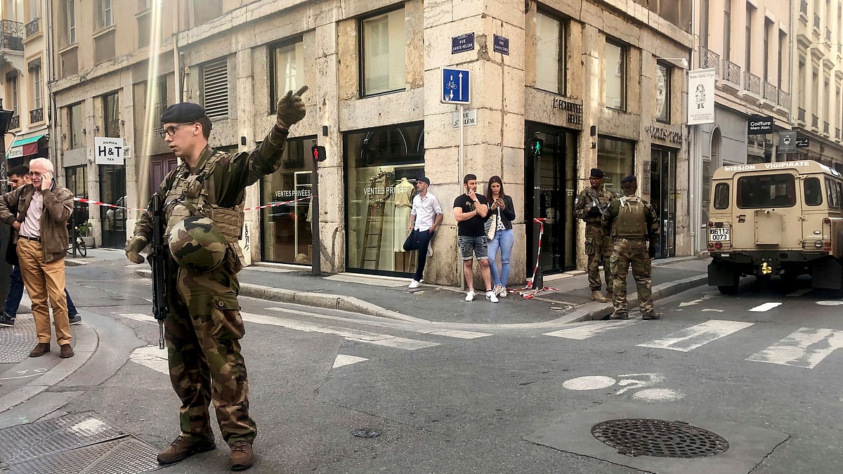Soldiers of French anti terrorist plan ‘Vigipirate Mission’, secure the area, near the site of a suspected bomb attack in central Lyon.