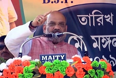Paschim Medinipur: BJP chief Amit Shah addresses a public rally in Paschim Medinipur, West Bengal, on May 7, 2019. (Photo: IANS)