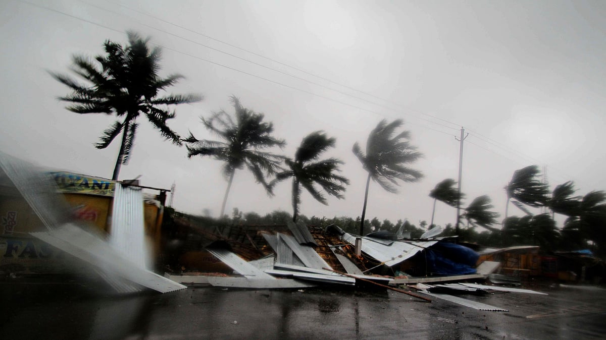 Street shops are seen collapsed due to gusty winds preceding the landfall of cyclone Fani.
