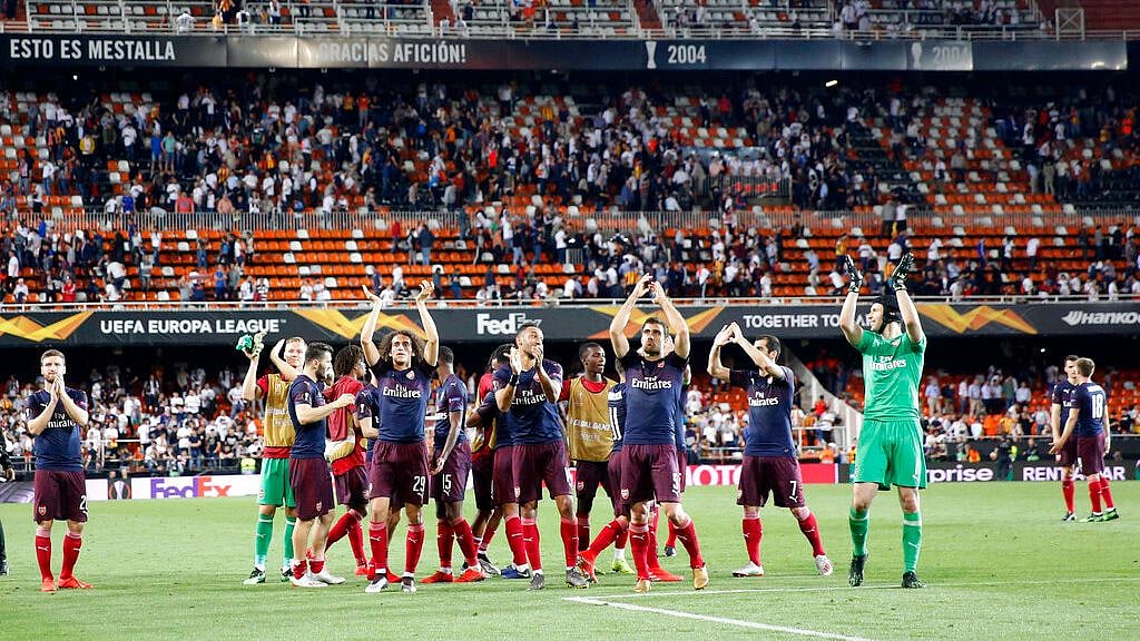 Arsenal players celebrate their victory against Valencia in the Europa League semifinal.