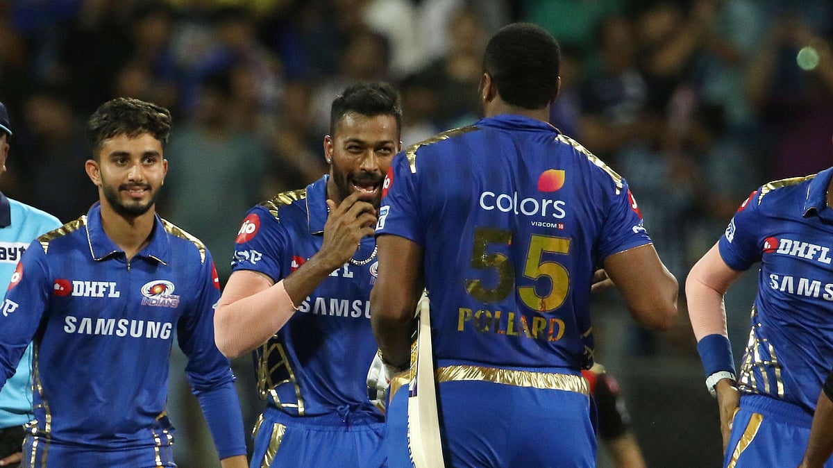 Hardik Pandya of Mumbai Indians and Kieron Pollard of Mumbai Indians after winning in the super over of the match 51 of the Vivo Indian Premier League Season 12, 2019.