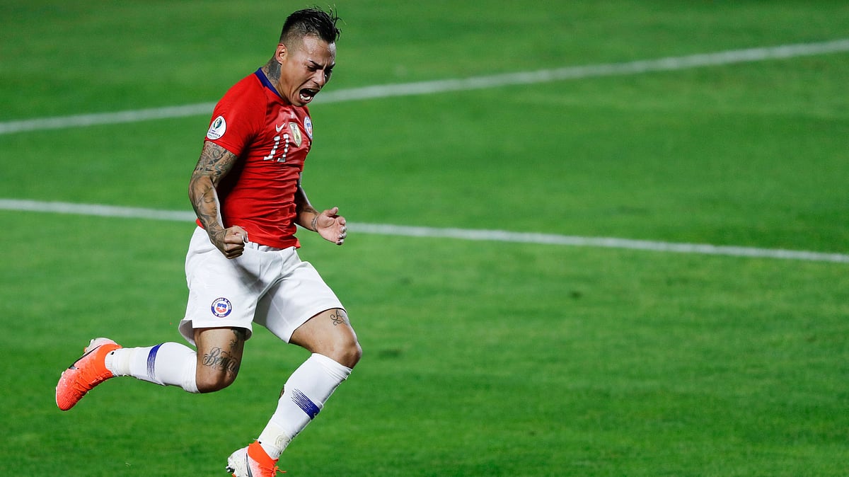 Chile’s Eduardo Vargas celebrates scoring his side’s 4th goal during a Copa America Group C soccer match against Japan at Morumbi stadium in Sao Paulo, Brazil.