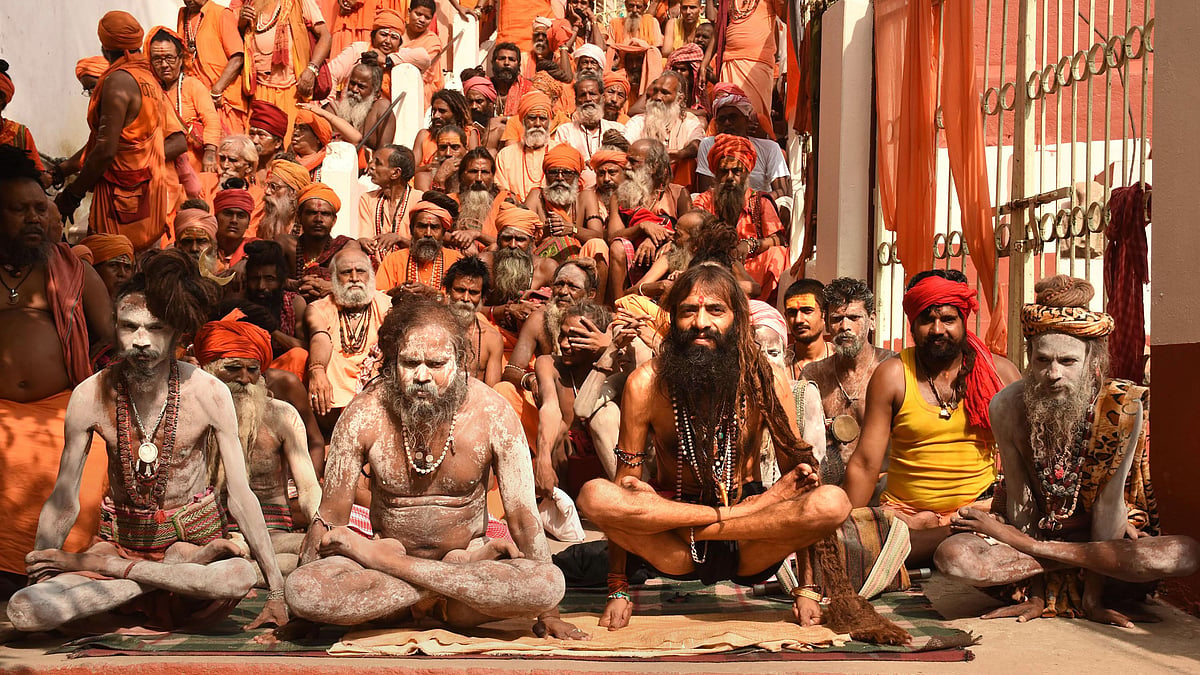 Sadhus perform yoga at Kamakhya Temple to mark the 5th International Day of Yoga, in Guwahati.
