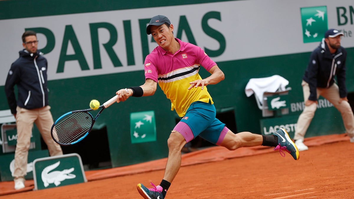 Japan’s Kei Nishikori plays a shot against France’s Benoit Paire during their fourth round match of the French Open tennis tournament at the Roland Garros stadium in Paris, Monday, June 3, 2019.&nbsp;