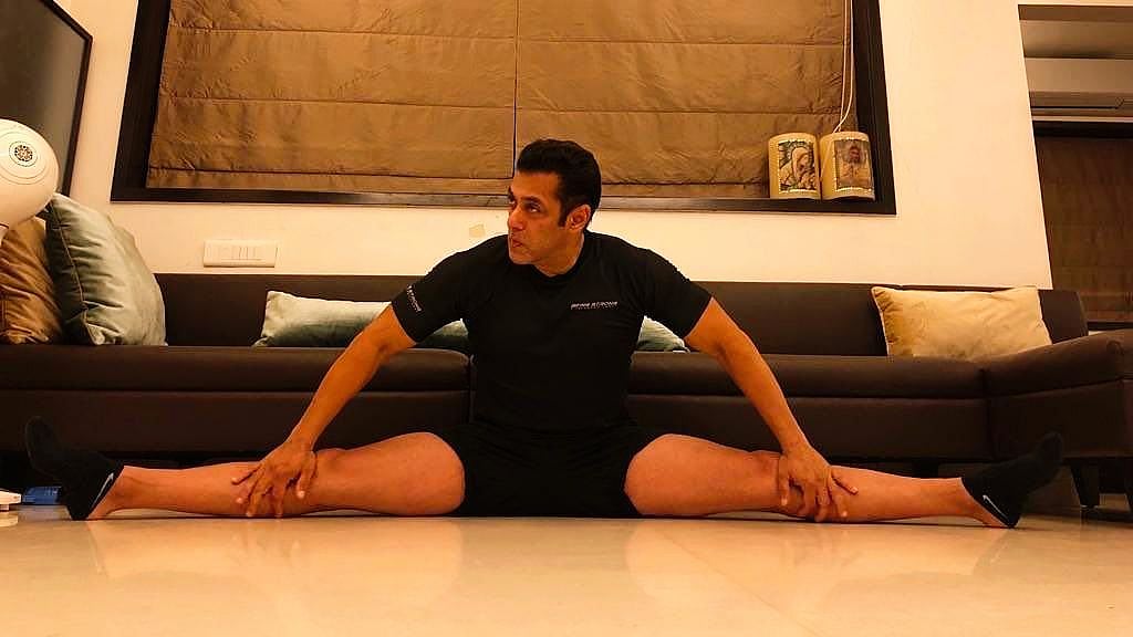 Salman Khan does a split.