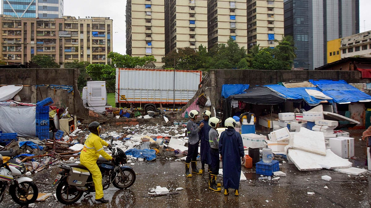 Debris seen after Kamgar Maidan wall collapse following monsoon rainfall, in which three people were injured, at Elphinstone in Mumbai.