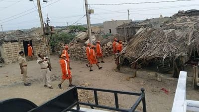 Porbandar: A team of NDRF facilitating evacuation across the Porbandar-Diu-Veraval coastal expanse in the wake of Cyclone Vayu which is likely to hit the Gujarat coast on Thursday; on 12 June 2019.