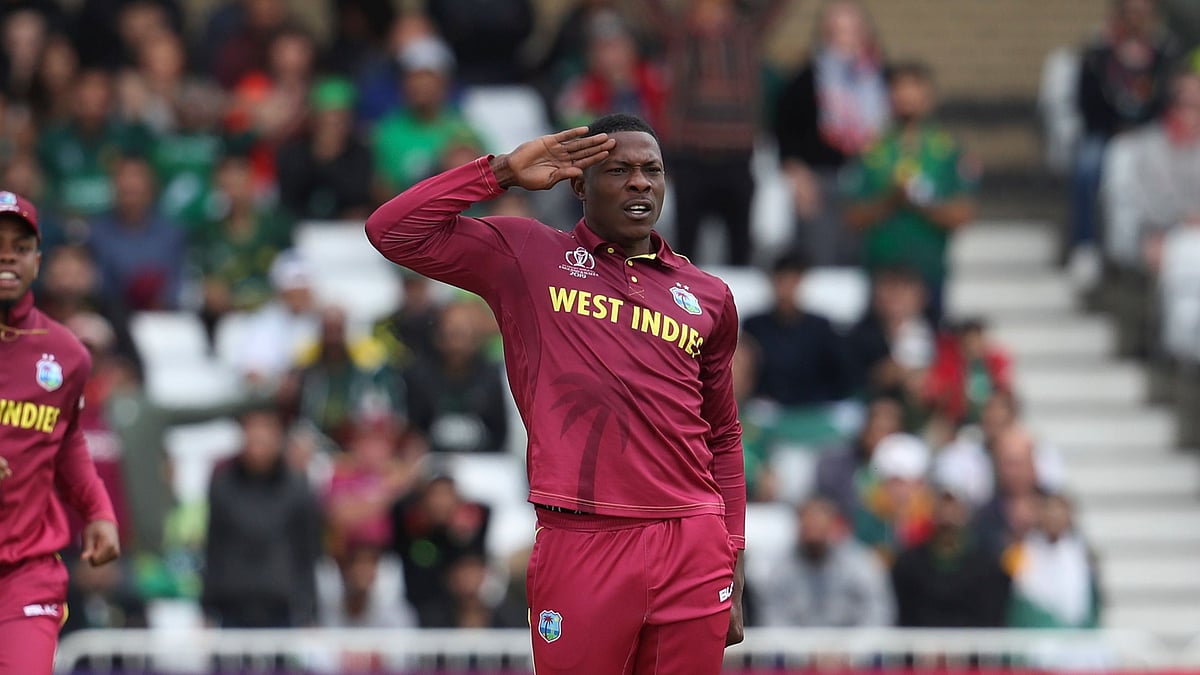 West Indies’ Sheldon Cottrell celebrates a wicket with his signature salute during the 2019 ICC World Cup.&nbsp;
