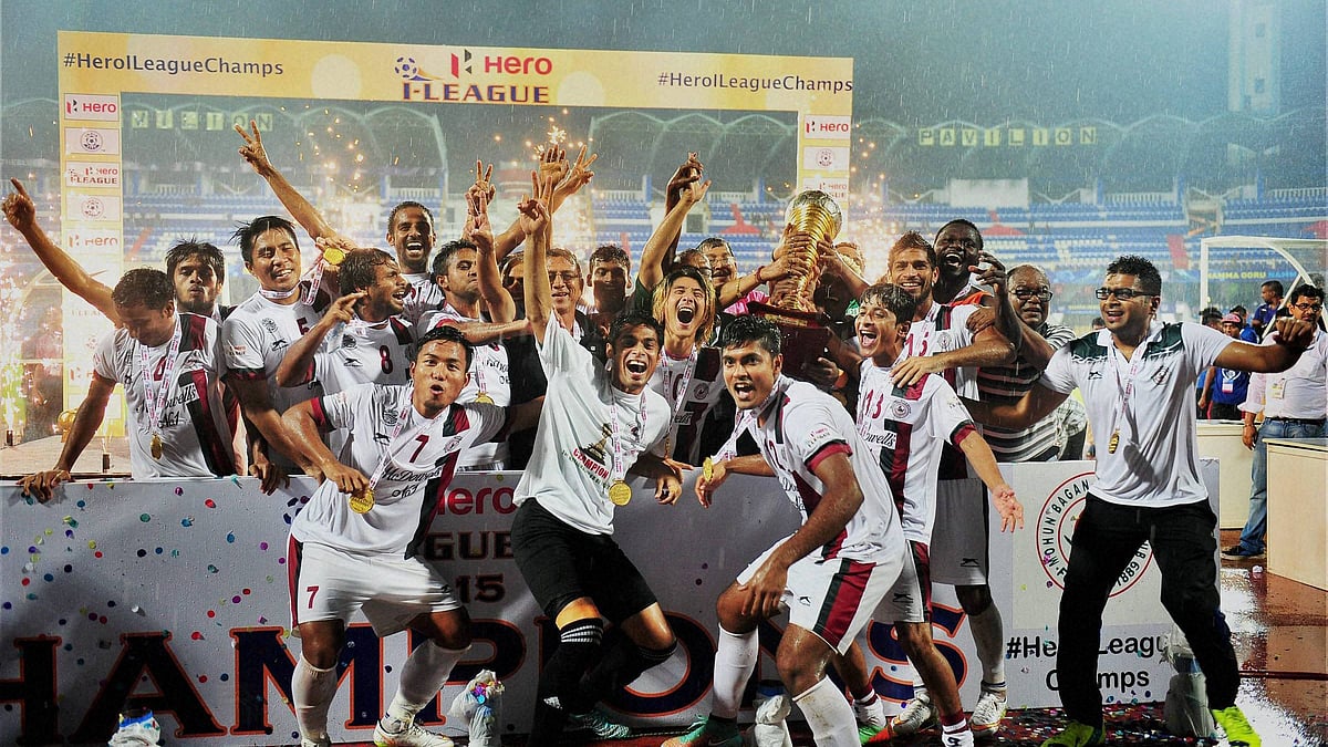 Mohun Bagan players celebrate after retaining the 2015 I-League title.