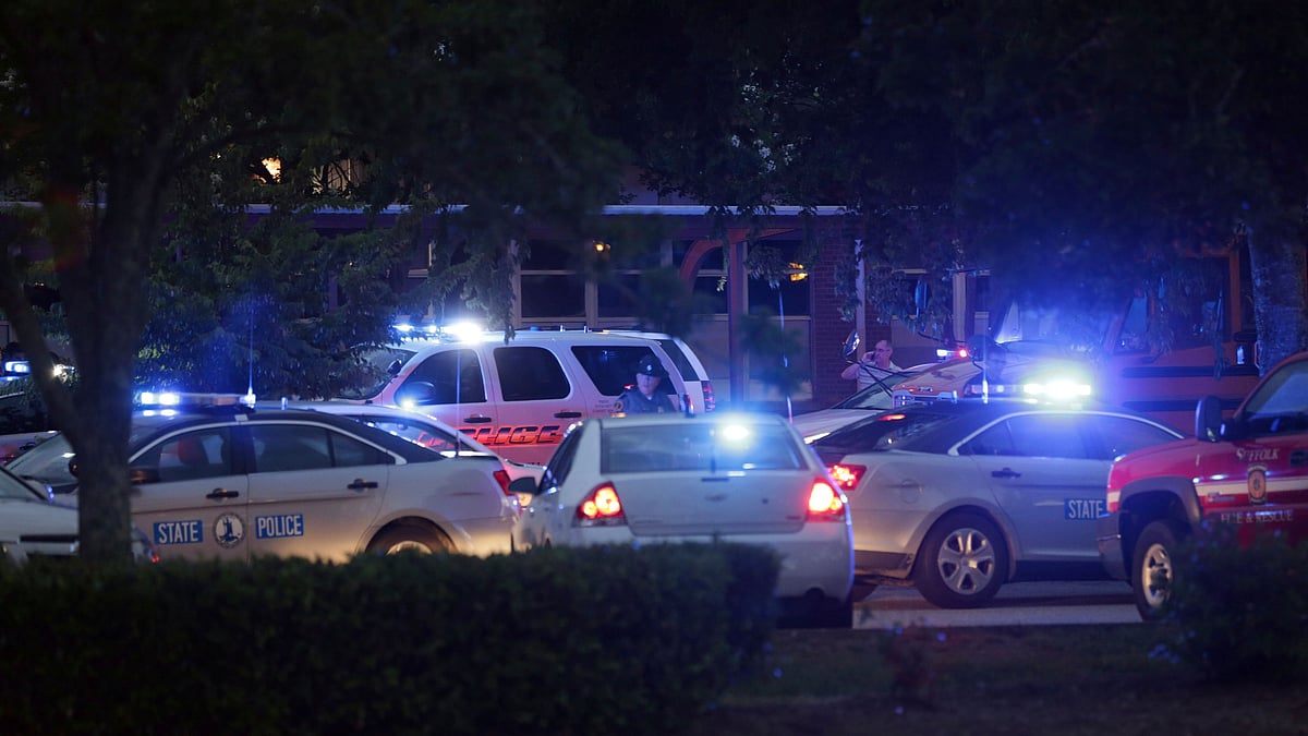 Emergency vehicles fill the parking lot at the Princess Anne Middle School in Virginia Beach.