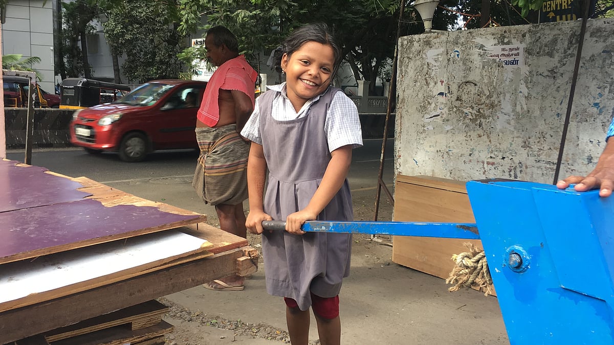 Everyday when Asma comes back from school in the evening, she runs to the hand pump on the road with a pot. 