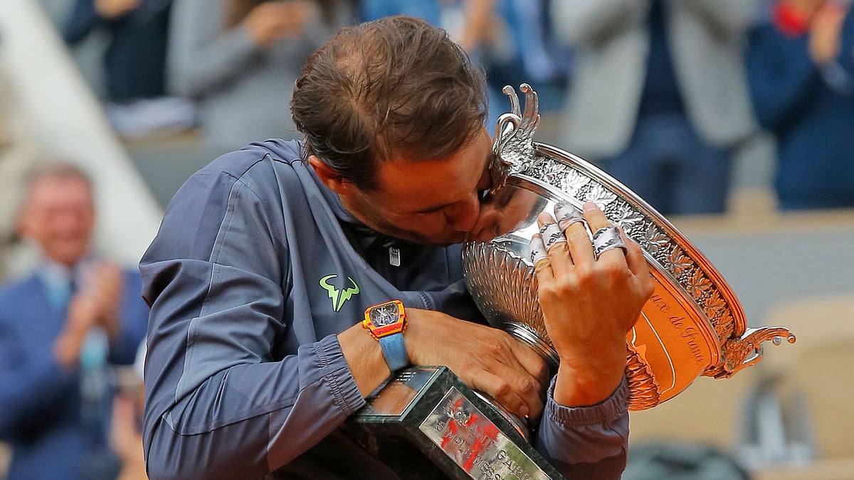 Spain’s Rafael Nadal celebrates his record 12th French Open tennis tournament title after winning his men’s final match against Austria’s Dominic Thiem in four sets, 6-3, 5-7, 6-1, 6-1, at the Roland Garros stadium in Paris, Sunday, June 9, 2019. 