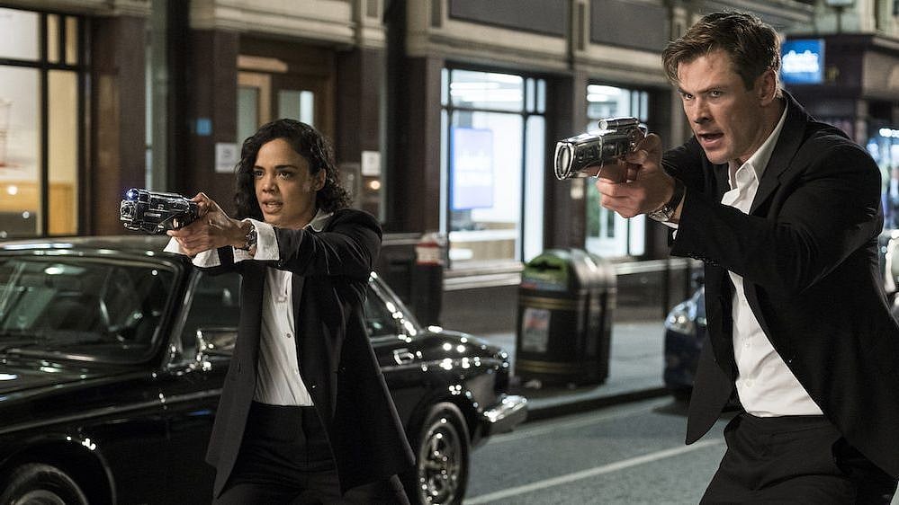 Tessa Thompson and Chris Hemsworth in <i>Men In Black: International.</i>