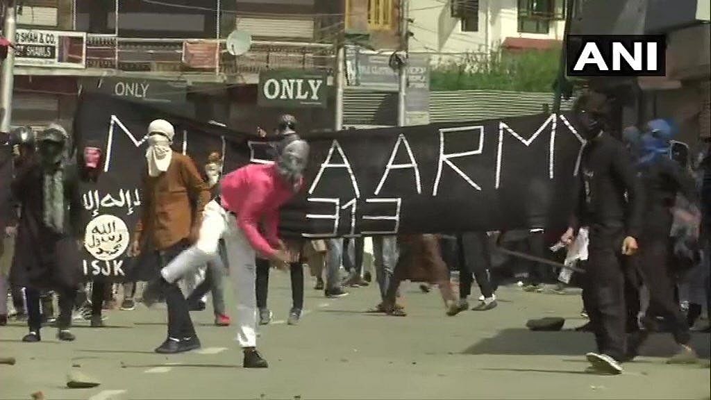 In Nowhatta area of the city, masked protestors reportedly held banners in support of banned Jaish-e-Mohammed chief Masood Azhar and slain militant commander Zakir Musa.