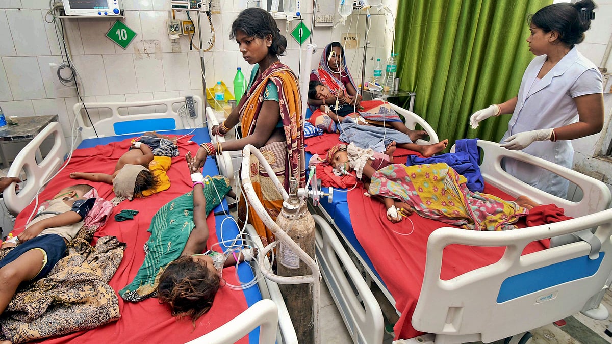 Children showing symptoms of acute encephalitis syndrome undergo treatment at Sri Krishna Medical College Hospital in Muzaffarpur, Bihar.