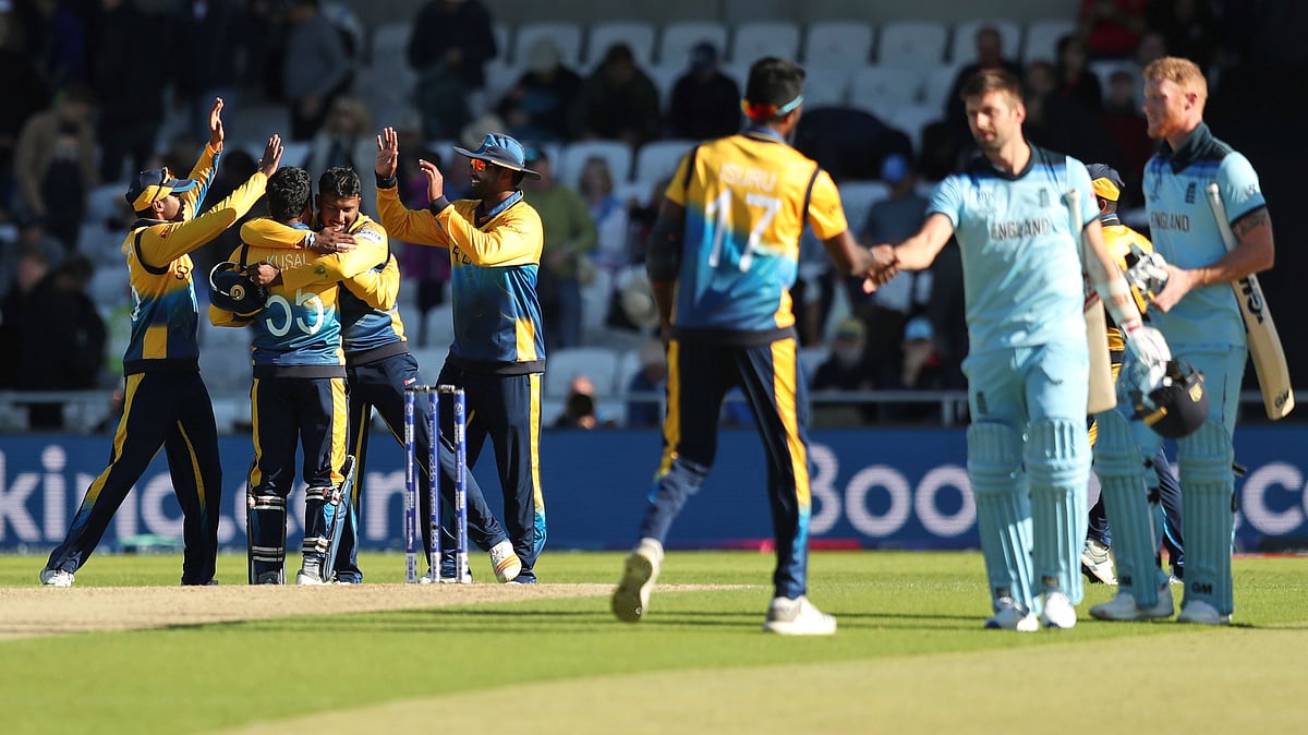 Lasith Malinga took four top-order wickets and Dhananjaya de Silva snared three in nine balls as England was bowled out for 212.