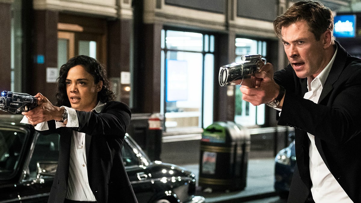 Tessa Thompson and Chris Hemsworth in <i>MIB: International</i>.