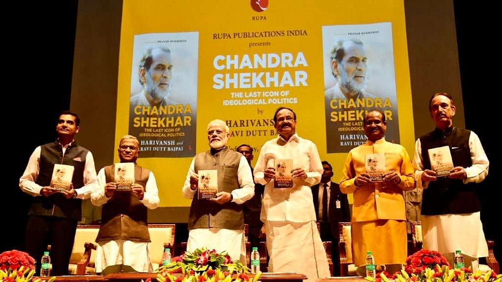 PM Modi, Rajya Sabha Deputy Speaker Harivansh, Vice President Venkaiah Naidu and others at the book launch.
