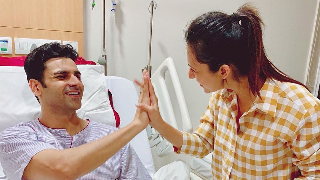 Divyanka Tripathi (L) and husband Vivek Dahiya (R).
