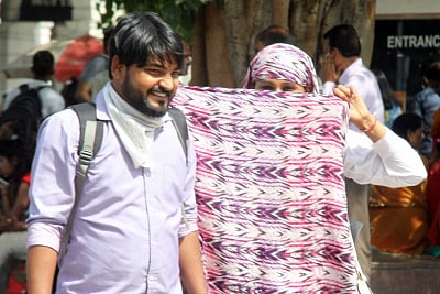 New Delhi: A lady covers her face to avoid scorching sun on a hot summer day in New Delhi on June 14, 2019. (Photo: Bidesh Manna/IANS)
