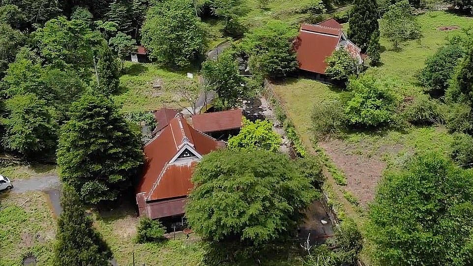 A videographer explores an abandoned village.