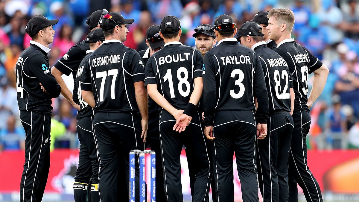 New Zealand players in a huddle during the semifinal against India.