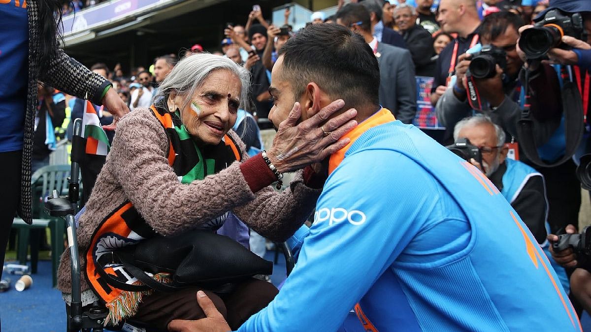 Charulata Patel caught everyone’s attention by blowing a bright yellow vuvuzela and waving the Indian flag everytime a boundary was struck.