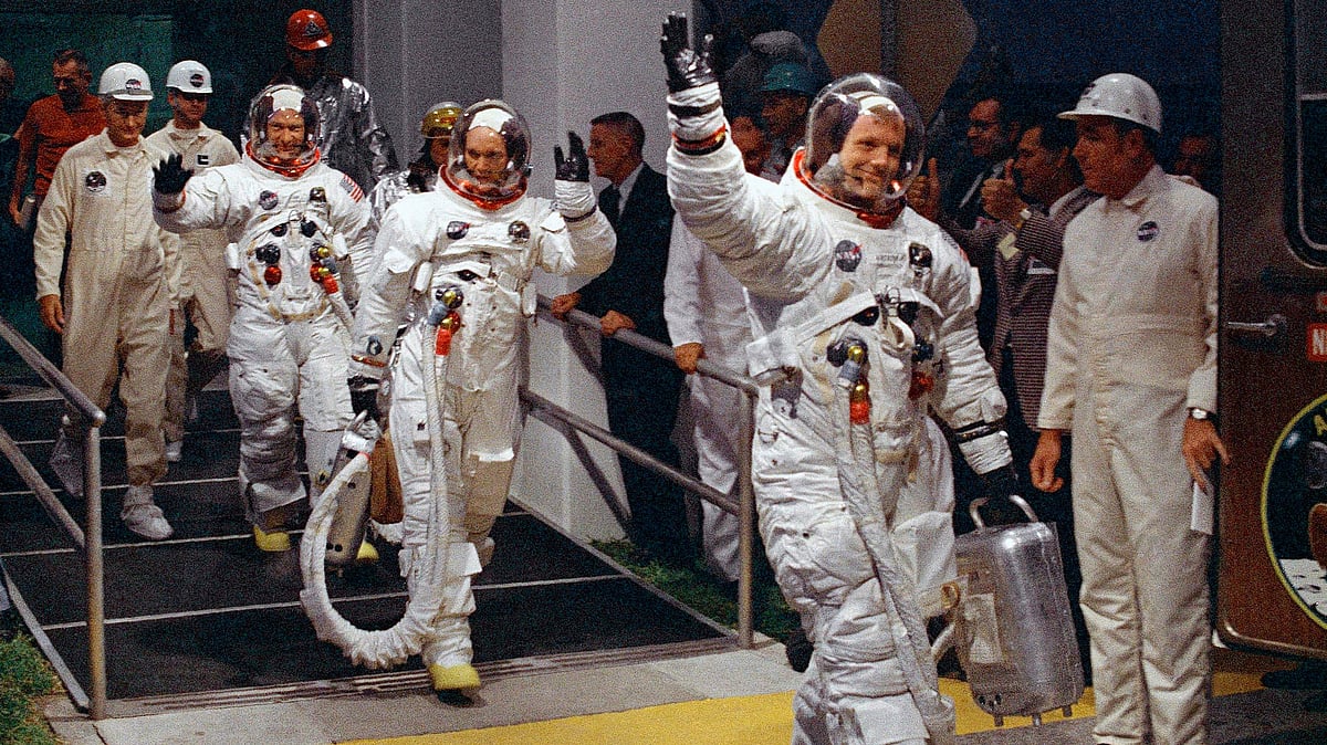 In this July 16, 1969 file photo, from right, Neil Armstrong, Michael Collins and Buzz Aldrin walk to the van that will take the crew to the launchpad at Kennedy Space Center on Merritt Island, Florida. 