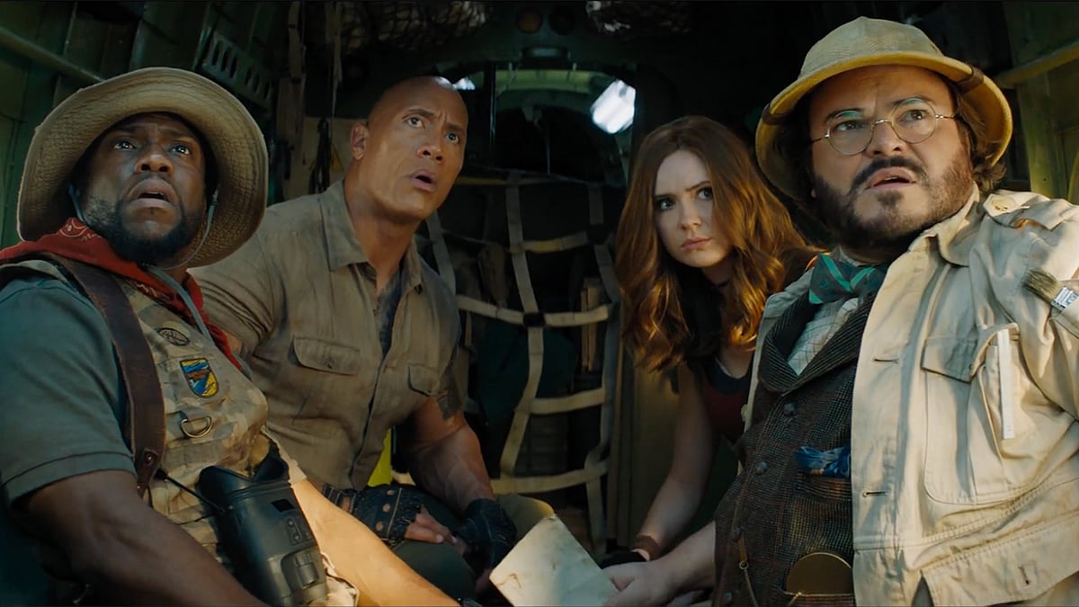 Kevin Hart, Dwayne Johnson, Karen Gillan and Jack Black in a still from <i>Jumanji: The Next Level</i>.