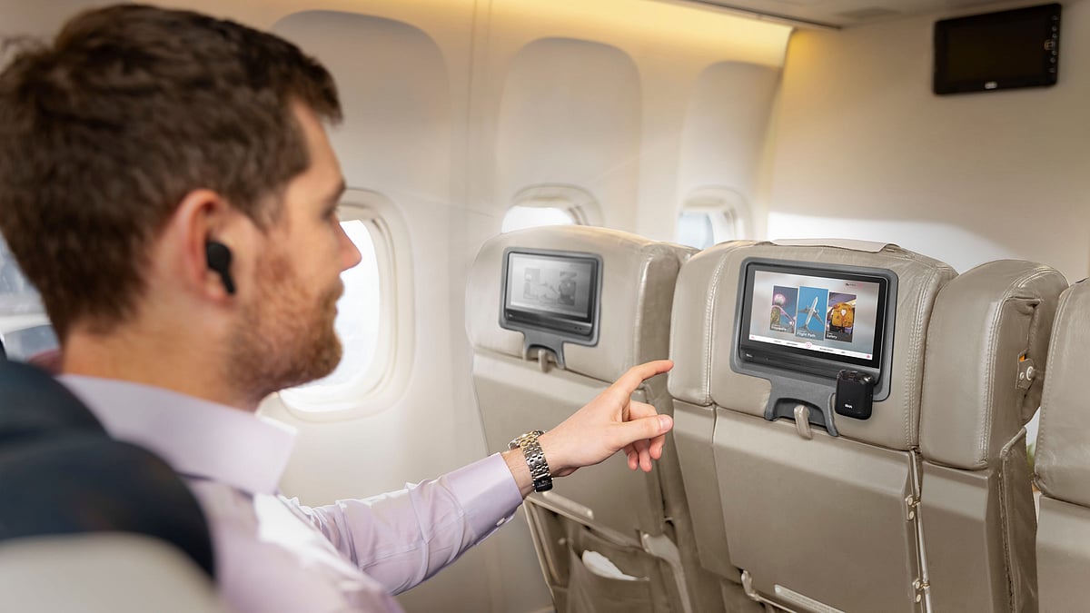 The Bluetooth adapter will let you connect wireless headphones to the in-flight entertainment system.