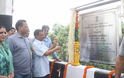 New Delhi: Delhi Chief Minister Arvind Kejriwal and Public Works Department Minister Satyendra Kumar Jain unveil the plaque to inaugurate the newly constructed Rao Tula Ram (RTR) Flyover at Outer Ring Road near Munirka in New Delhi, on July 16, 2019. (Photo: IANS)