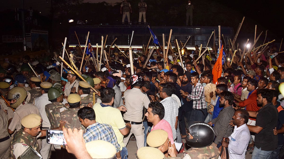 Dalit protesters were met with tear gas and lathis as they marched towards the site of the demolished Ravidas temple in Delhi.
