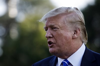 WASHINGTON, Aug. 31, 2019 (Xinhua) -- U.S. President Donald Trump speaks to reporters before leaving the White House in Washington D.C., the United States, on Aug. 30, 2019. Donald Trump on Friday approved state of emergency declaration request from Florida as the powerful Hurricane Dorian marched closer to the state. (Photo by Ting Shen/Xinhua/IANS)