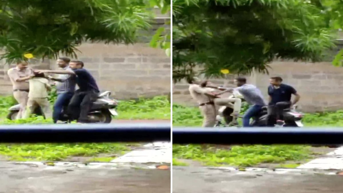 Still from the viral video where the cops are seen harassing the boy.