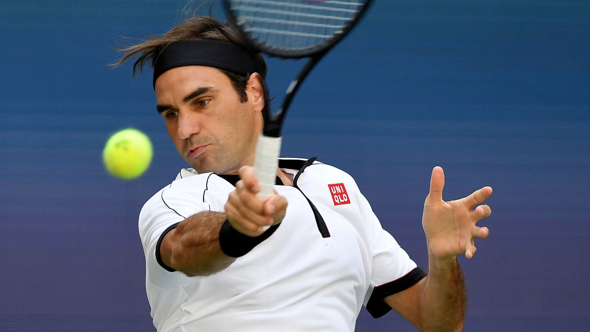Roger Federer didn’t change much, outside of where his team was sitting.