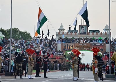 Attri: Beating Retreat ceremony underway at Attari-Wagha border on the eve of Independence Day in Attari near Amritsar on Aug 14, 2019. (Photo: IANS)