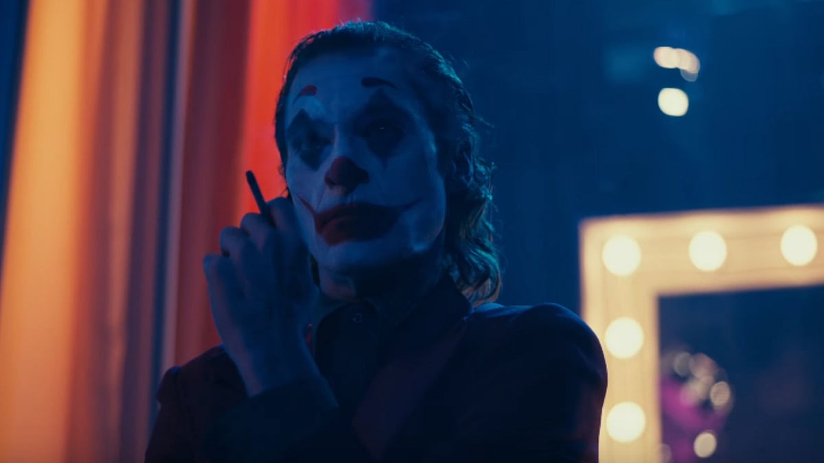 Joaquin Phoenix as Joker.