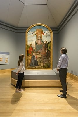 Visitors in front of The Virgin and Child with Saints by Giovanni Martini da Udine in Room 56. (Photo Source: National Gallery, UK)