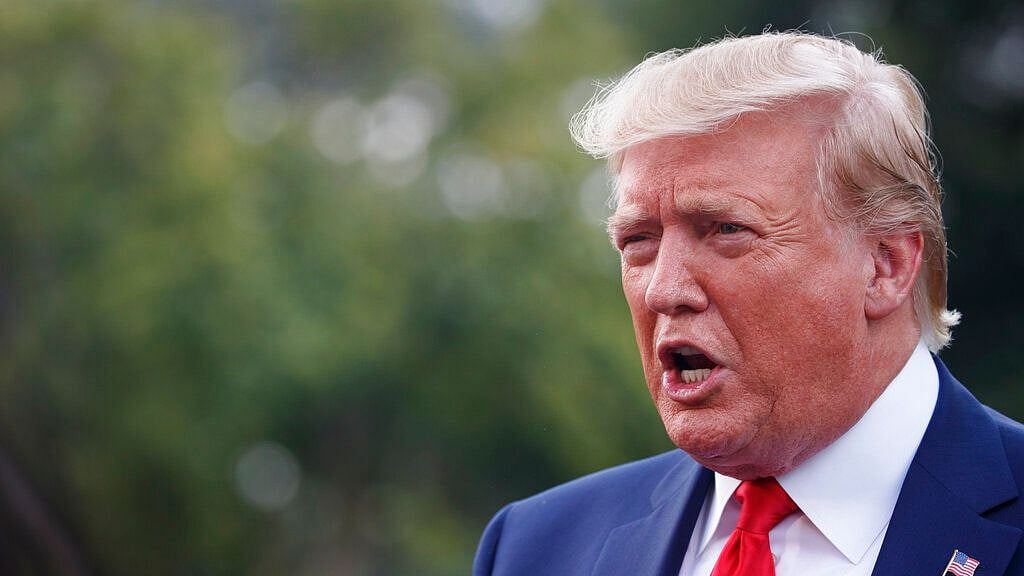 US President Donald Trump speaks to media before departing the White House in Washington on 1 Aug 2019, for the the short trip to Andrews Air Force Base. 