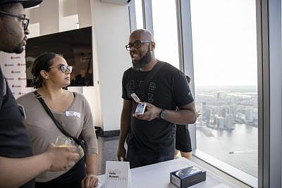 NEW YORK, Aug. 22, 2019 (Xinhua) -- People experience Huawei mobile phones during an interactive reception in New York, the United States, on Aug. 21, 2019. Chinese tech giant Huawei would continue enhancing its transparency and regard itself as a public-listed company, an executive said on Wednesday. (Xinhua/Li Muzi/IANS)